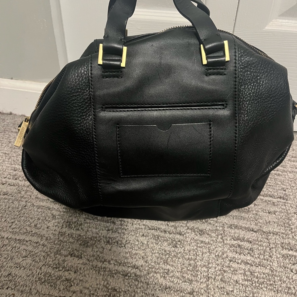 Kate Spade Saturday Black Leather Handbag with Gold Accents